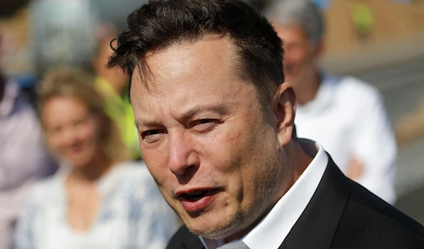 Tesla CEO Elon Musk talks to media as he arrives to visit the construction site of the future U.S. electric car giant Tesla, in Gruenheide near Berlin, Germany, Sept. 3, 2020. (AFP Photo)