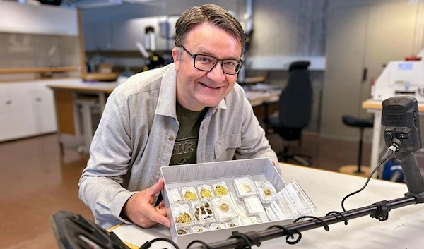 Erlend Bore, who dreamed of being an archaeologist as a child, found gold medallions, pearls and rings. (AFP/Getty Images