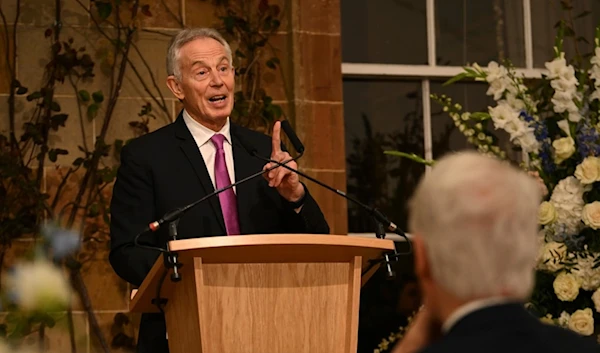 Former British Prime Minister Sir Tony Blair gives a speech at Hillsborough Castle, in Belfast, Wednesday, April 19, 2023. (Pool Photo via AP)