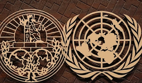 The logo of the International Court of Justice, left, and the UN sit on the judges bench in The Hague, Netherlands, October 10,2023. (AP)