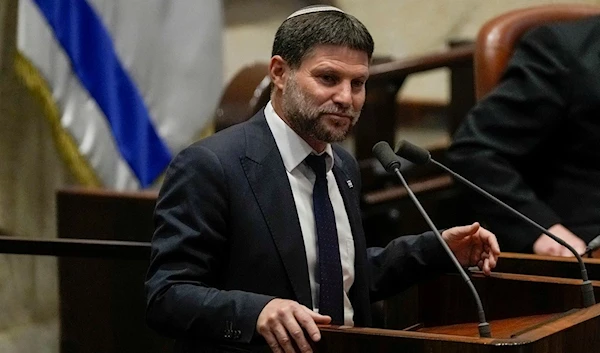 Finance Minister Bezalel Smotrich speaks at the Knesset, Occupied Al-Quds on Monday, July 10, 2023 (AP)