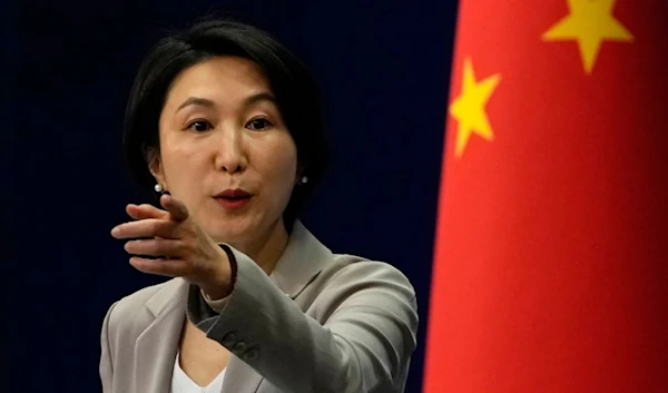 Chinese Foreign Ministry spokesperson Mao Ning gestures during a press conference at the Ministry of Foreign Affairs in Beijing, on July 26, 2023 (AP)