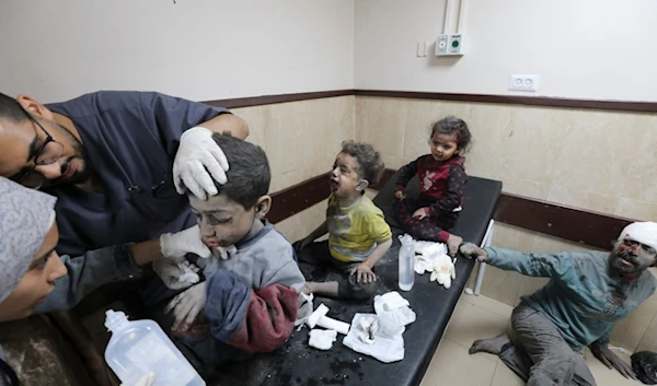 Palestinian children wounded in the Israeli bombardment of the Gaza Strip are treated at al Aqsa Hospital on Deir al Balah, Gaza Strip, Tuesday, Nov. 21, 2023. (AP)