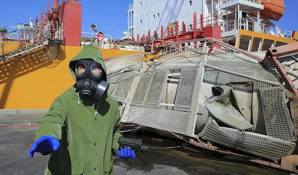 Experts investigate at the sight of a toxic gas explosion in Jordan's Red Sea port of Aqaba, Tuesday, June 28,2022( AP )