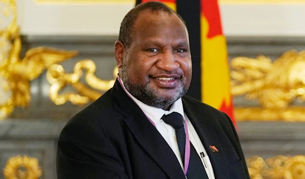 Papua New Guinean Prime Minister James Marape poses for a photo at Akasaka Palace state guest house in Tokyo on Sept. 27, 2022. (AP)