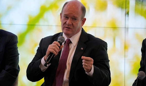 Senator Chris Coons speaks during an event at the COP28 U.N. Climate Summit, in Dubai, United Arab Emirates,  Sunday, December 10, 2023 (AP)