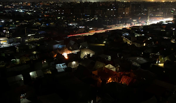 A view of the makeshift tent camp where Palestinians displaced by the Israeli bombardment of the Gaza Strip are staying, in the Mouwasi area on Sunday, Dec. 31, 2023. (AP)