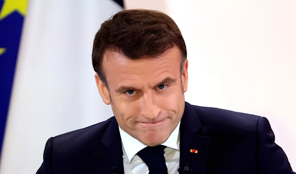 French President Emmanuel Macron prepares to hold his first prime-time news conference to announce his top priorities for the year on January 16, 2024. (AP)