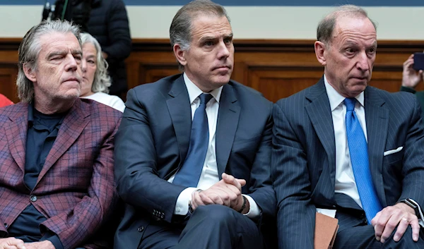 Hunter Biden, President Joe Biden's son, center, accompanied by his attorney Abbe Lowell, right, at a House Oversight Committee hearing as Republicans are taking the first step toward holding him in contempt of Congress, Wednesday, Jan. 10, 2024(AP)