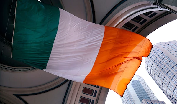 The national flag of Ireland flies at Rowes Wharf on St. Patrick's Day, Thursday, March 17, 2022, in Boston(AP)