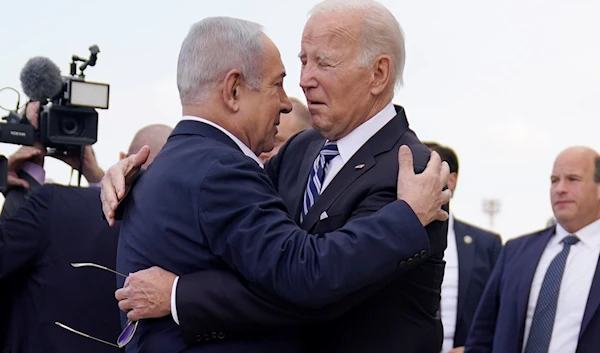 President Joe Biden is greeted by Israeli Prime Minister Benjamin Netanyahu after arriving at the Airport, on Oct. 18, 2023, in Occupied Palestine.(AP)