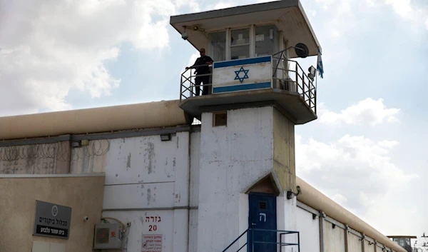 An Israeli occupation prison guard stands at the Gilboa prison in northern occupied Palestine, Monday, Sept. 6, 2021. (AP)