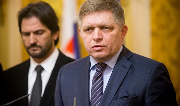 In this Wednesday, Feb. 28, 2018 file photo, Slovak Prime Minister Robert Fico, right, gives a media statement, with Minister of Interior Robert Kalinak, left, in Bratislava, Slovakia. (AP)