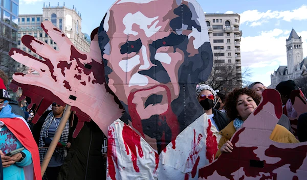 Demonstrators rally during the March on Washington for Gaza at Freedom Plaza in Washington, Saturday, Jan. 13, 2024(AP)