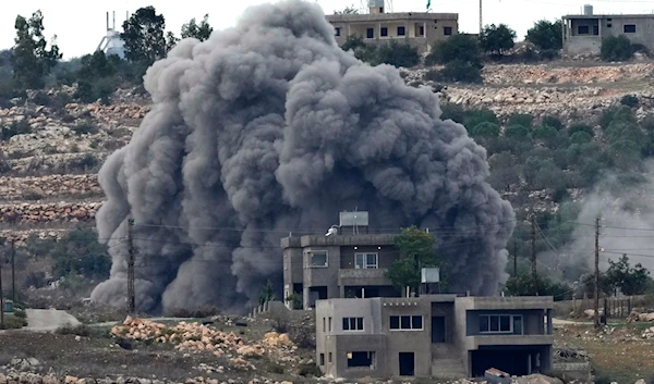 Black smoke rises from an Israeli airstrike on the outskirts of Aita al-Shaab, a Lebanese border village with Palestine in south Lebanon, Monday, Nov. 13, 2023.(AP)