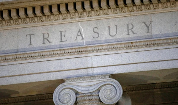 This June 6, 2019, file photo shows the U.S. Treasury Department building at dusk in Washington. (AP)