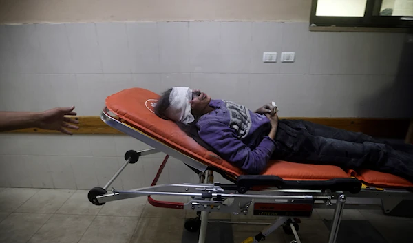 A Palestinian girl wounded in the Israeli bombardment of the Palestinian Red Crescent headquarters arrives at the Nasser hospital in Khan Younis, Southern Gaza Strip, Tuesday, Jan. 2, 2024(AP)