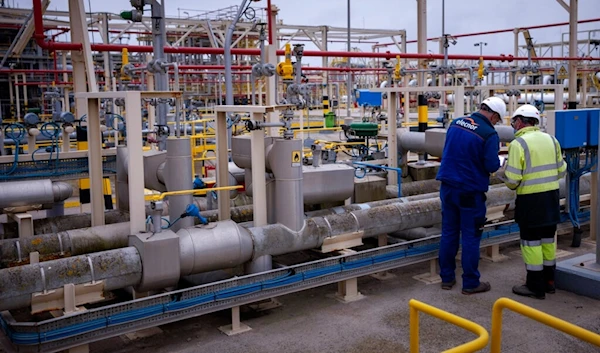 Operators work at Enagas regasification plant, the largest LNG plant in Europe, in Barcelona, Spain, March 29, 2022. (AP)