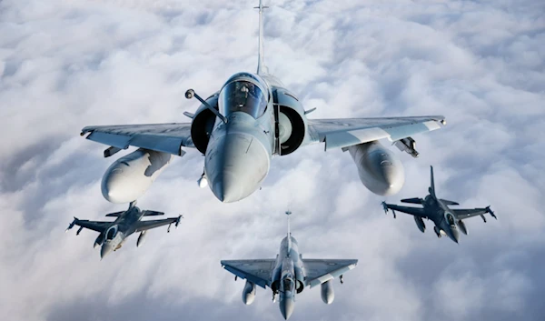 F-16, Mirage 2000 and C-27 flew training missions above Lithuania, conducting close formation flights and aerial combat drills to demonstrate capabilities and hone flying skills