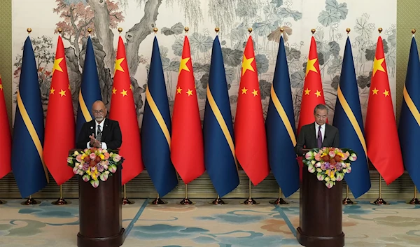 Chinese Foreign Minister Wang Yi, and Minister of Foreign Affairs and Trade of Nauru Lionel Aingimea speak after signing a joint communique on the resumption of diplomatic relations between both countries  in Beijing, Jan. 24, 2024(AP)