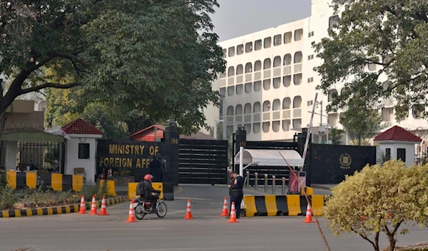 Police officers stand guard at the main entry gate of Pakistan's Ministry of Foreign Affairs, in Islamabad, Pakistan, Thursday, Jan. 18, 2024. (AP)