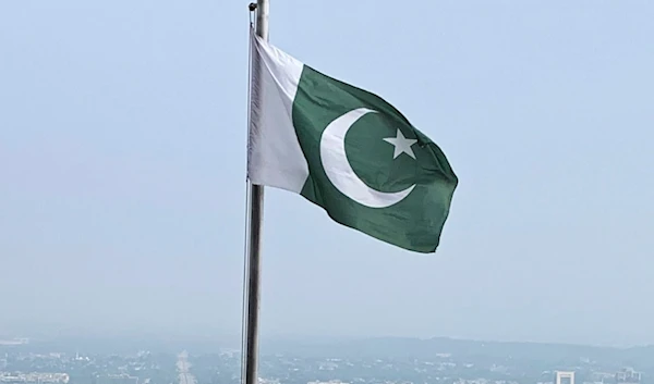 A Pakistani flag flies on a lookout in Islamabad, Pakistan, on July 27, 2022. (AP)