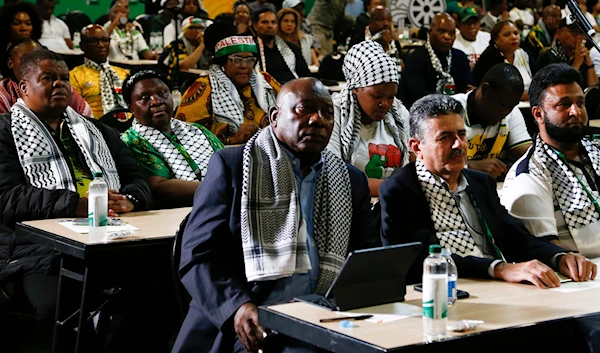 South African President Cyril Ramaphosa, first row left, listens in Johannesburg, January 26, 2024, to the ruling from the International Criminal Court (AP)