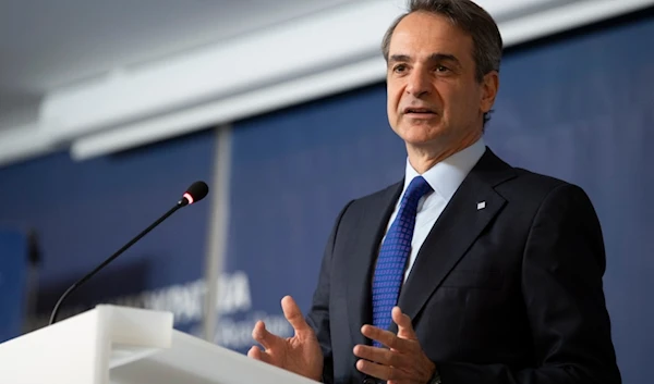 Greece's Prime Minister Kyriakos Mitsotakis speaks at a panel discussion on migration in Athens, Greece, on Monday, Jan. 8, 2024 (AP)