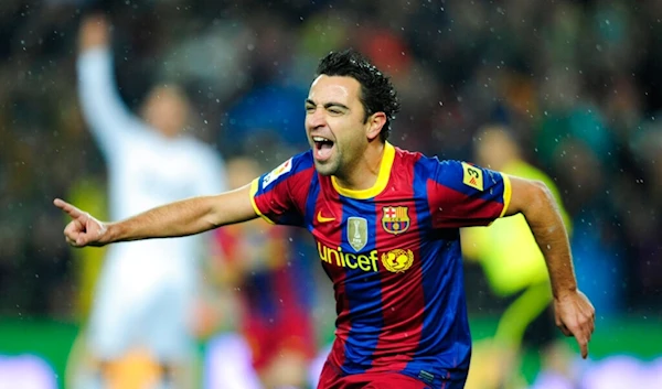 Barcelona's Xavi Hernandez reacts after scoring against Real Madrid, during a Spanish La Liga soccer match at the Camp Nou stadium in Barcelona, Spain, Monday, Nov. 29, 2010. (AP)