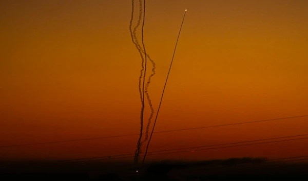 Rockets are fired toward Israel from the Gaza Strip, as seen from southern occupied Palestine, Friday, Dec. 15, 2023. (AP)