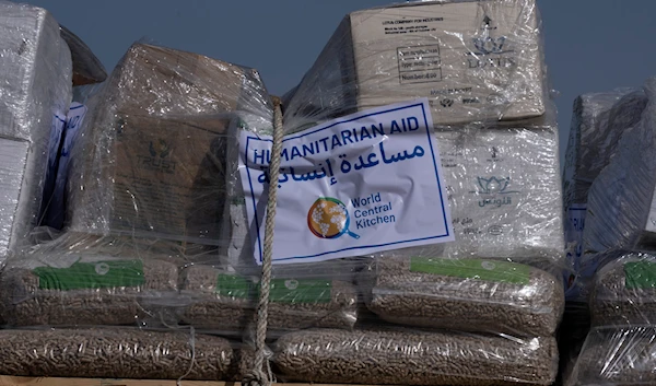 Humanitarian aid bound for the Gaza Strip, seen on a truck at a holding area at 'Kerem Shalom' Crossing on the intersection of two borders: between Egypt and southern occupied Palestine Wednesday, Jan. 10, 2024.(AP)