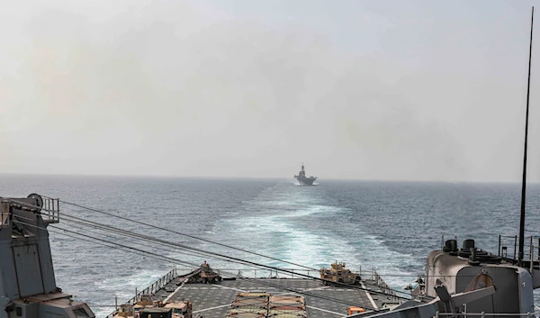 Amphibious dock landing ship USS Carter Hall and amphibious assault ship USS Bataan transit the Bab al-Mandeb strait on August 9, 2023 (US Navy via AP)