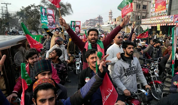 Supporters of former prime minister Imran Khan and political party Pakistan Tehreek-e-Insaf (PTI) attend an election campaign rally in Lahore, Pakistan, Sunday, Jan. 28, 2024.(AP)