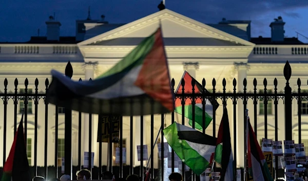 Anti-war activists wave their flags as they protest outside of T\the White House during a pro-Palestinian demonstration asking for a cease fire in Gaza in Washington, Saturday, Nov. 4, 2023.(AP)