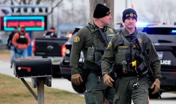 Police respond to Perry High School in Perry, Iowa., Jan. 4, 2024. (AP)