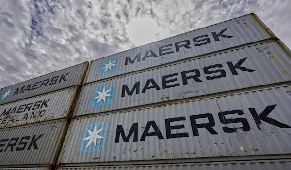 Container of the transport company 'Maersk' are located in Berlin's Westhafen port in Berlin, Germany, Wednesday, June 29, 2022 (AP Photo/Michael Sohn)