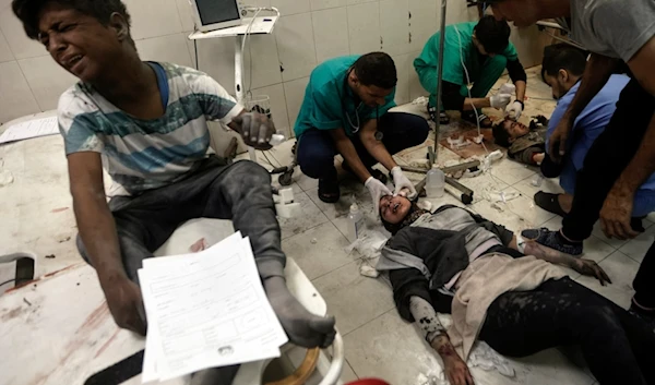 Palestinians wounded in the Israeli bombardment of the Gaza Strip receive treatment at the Nasser hospital in Khan Younis, Southern Gaza Strip, Sunday, Dec. 31, 2023. (AP)