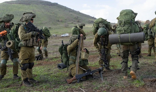 Israeli combat reservists and tank forces take part in training drills on the Lebanese front in the occupied Golan Heights, Thursday, Jan. 4, 2024. (AP Photo)