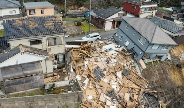 This aerial photo shows damaged and destroyed homes along a street in Wajima, Ishikawa prefecture, after a huge earthquake struck the prefecture's Noto region. (AFP)