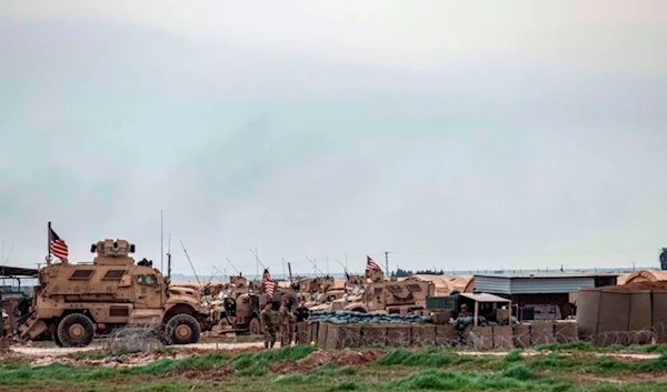 US soldiers and military vehicles at a base in Syria’s northeastern town of Rmelan on October 29, 2023. (AFP)