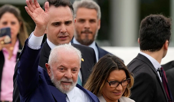 Brazilian President Luiz Inacio Lula da Silva leaves after attending a ceremony marking the one-year anniversary of rioters storming government buildings in support of former President Jair Bolsonaro, Brazil, Monday, Jan. 8, 2024 (AP)