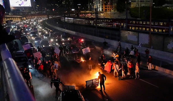 People demand Israeli Prime Minister Benjamin Netanyahu's resignation in "Tel Aviv", Palestine, Feb. 10, 2024. (AP Photo)