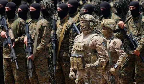 Hezbollah Resistance fighters carry out a training exercise in Aaramta village in Jezzine, southern lebanon , on Sunday, May 21,2023 (AP)