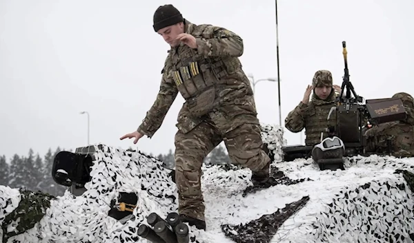 British soldiers take part in an exercise as part of NATO’s deployment in Poland and the Baltic nations in 2023. (AFP)