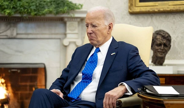 President Joe Biden sits in the Oval Office of the White House, Friday, Feb. 9, 2024, in Washington. (AP)