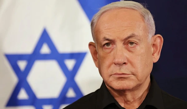 Israeli occupation's Prime Minister Benjamin Netanyahu attends a press conference in a military base in 'Tel Aviv', 'Israel', Saturday, Oct. 28, 2023. (AP)