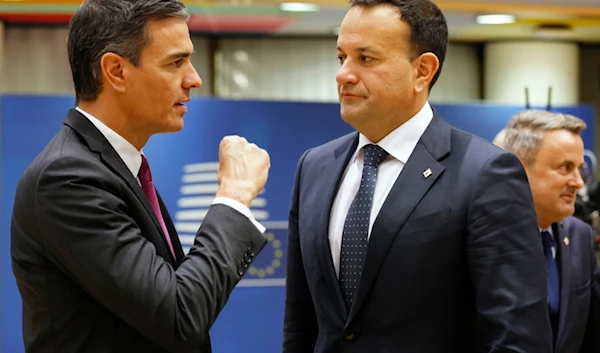 Spain's Prime Minister Pedro Sanchez, left, speaks with Ireland's Prime Minister Leo Varadkar during a round table meeting at an EU summit in Brussels, Thursday, Oct. 26, 2023. (AP)