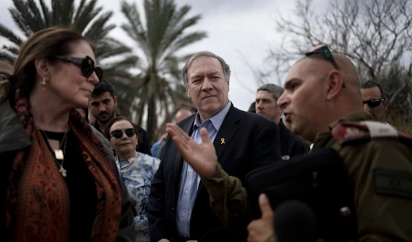 Former U.S. Secretary of State Mike Pompeo, center, and his wife, Susan, left, tour "Kibbutz Kfar Azza", southern Israel, near the Gaza border, Tuesday, Feb. 13, 2024, the site of a cross-border attack by Hamas on Oct. 7, 2023. (AP)