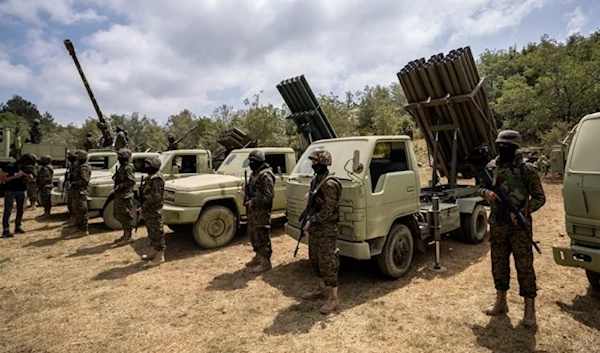 Fighters from the Lebanese Hezbollah carry out a training exercise in Aramata village in the Jezzine District, South Lebanon, May 21, 2023.(AP)