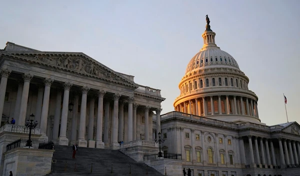 The suns begins to set on the Capitol building  in Washington, Wednesday, Jan. 4, 2023. (AP Photo/Alex Brandon)